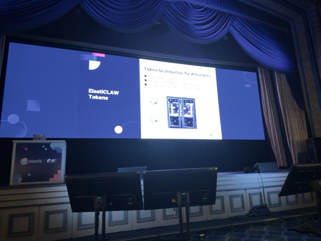 A large screen showing an Elastic slide about ElasticLAW tokens.