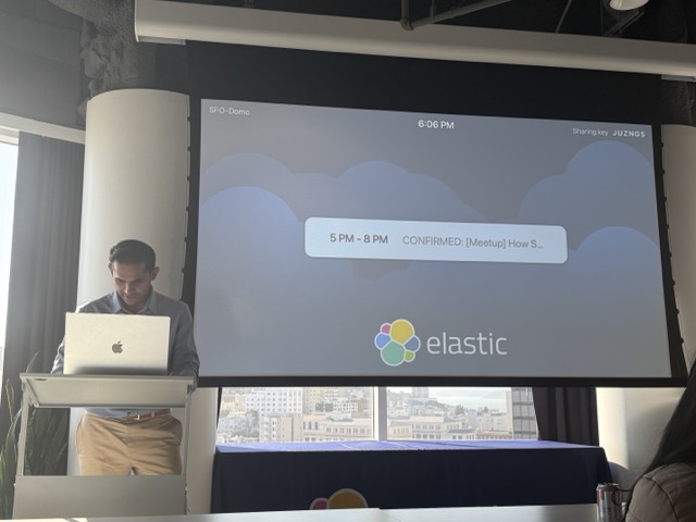 BK Bhate at a podium before an Elastic-branded screen.