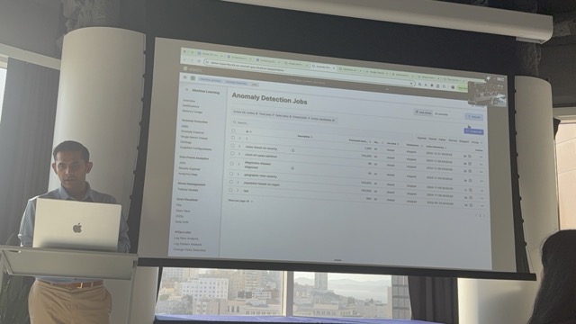 An Elastic anomaly detection jobs screen shown during a presentation.