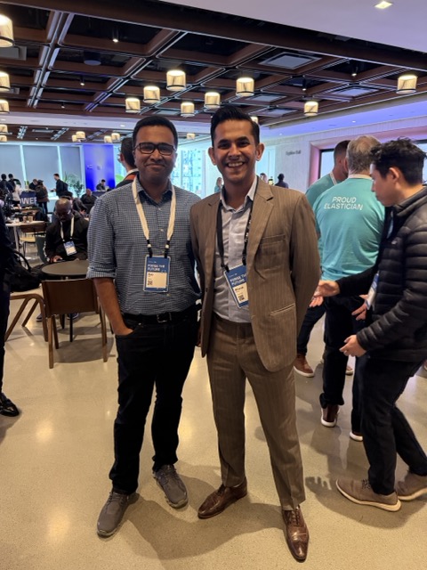 BK Bhate with another member of the Elastic community at an event.